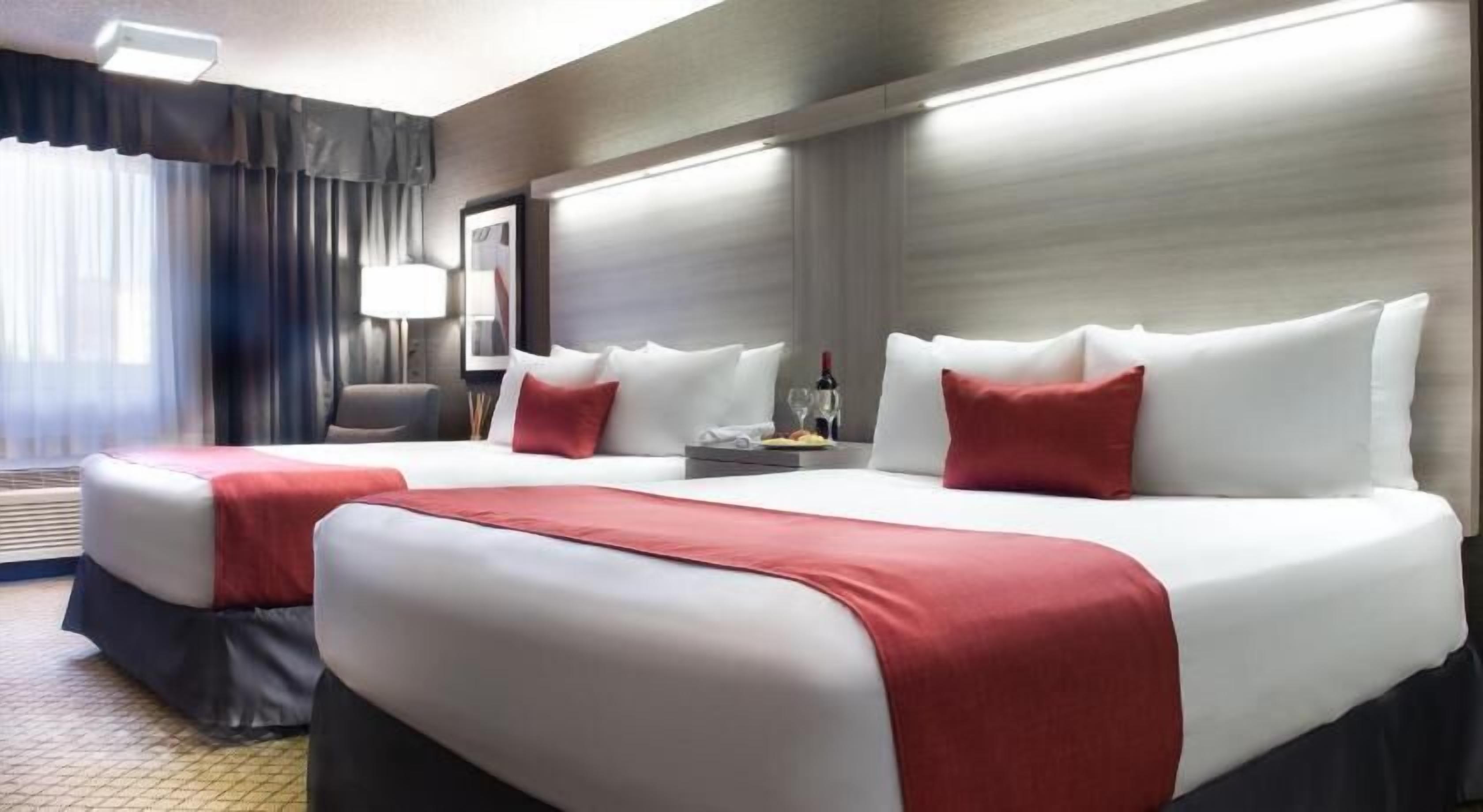 Ropa de cama de alta calidad y camas con pillow-top 