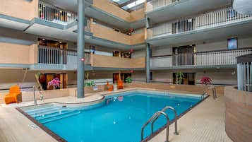 Indoor pool, open 9:00 AM to 9:00 PM, sun loungers