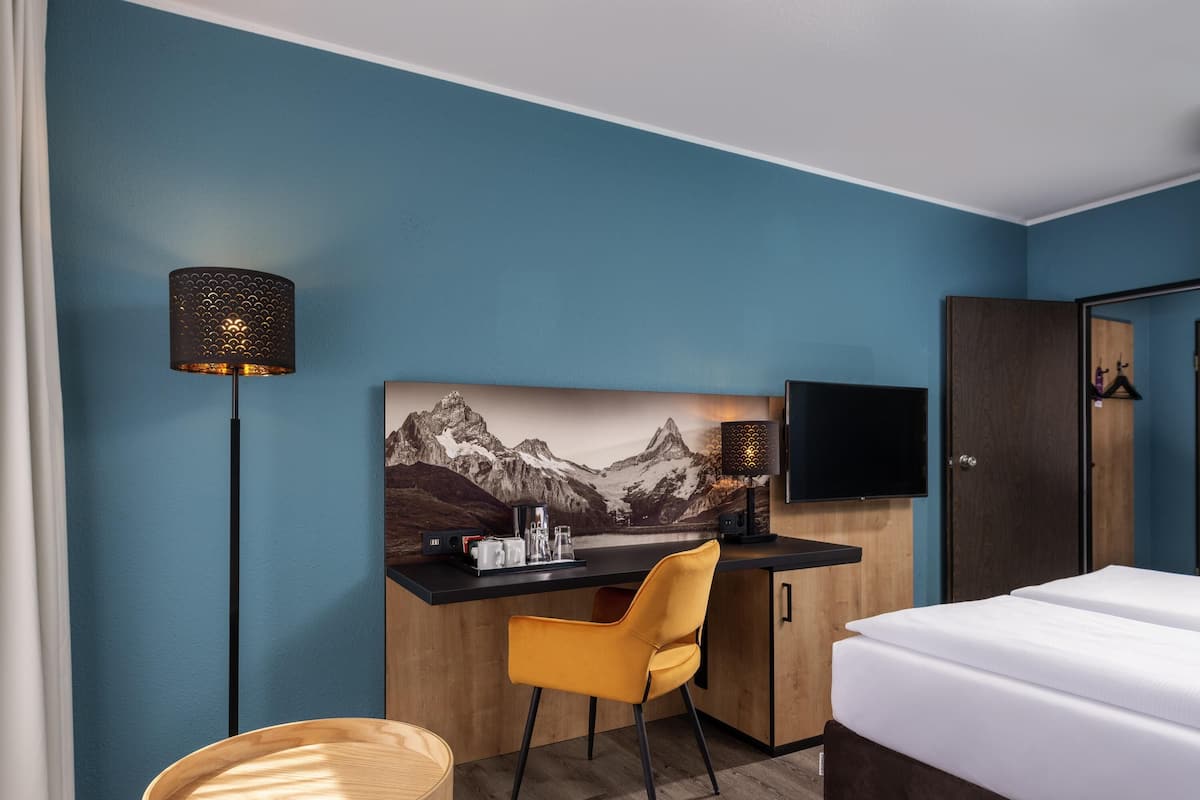 Literie hypoallergénique, coffres-forts dans les chambres, bureau