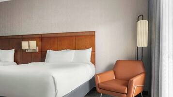 Desk, laptop workspace, blackout drapes, iron/ironing board