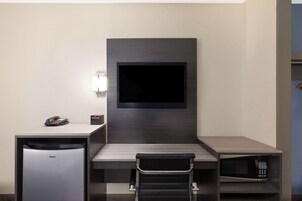 Premium bedding, desk, laptop workspace, soundproofing