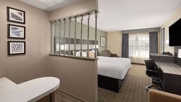 Suite, 1 King Bed, Non Smoking | Premium bedding, desk, laptop workspace, soundproofing
