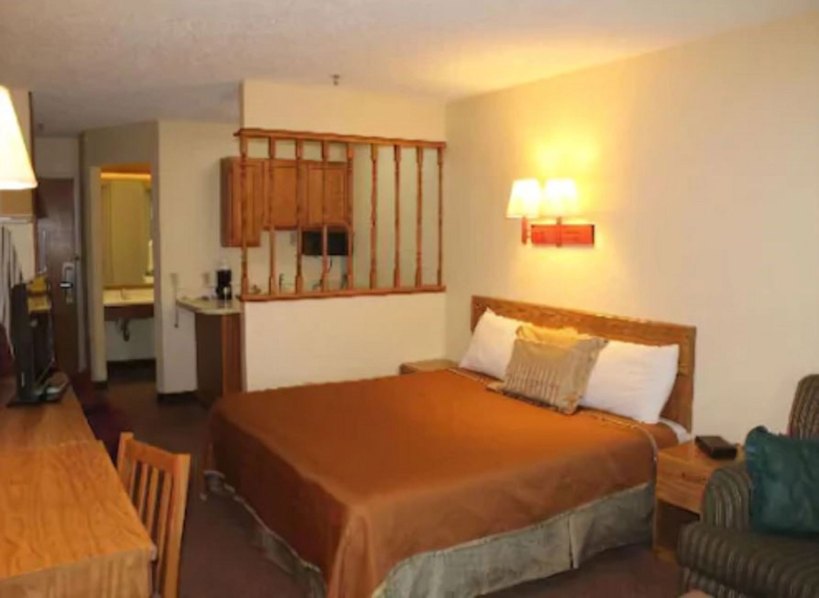 Premium bedding, desk, laptop workspace, soundproofing