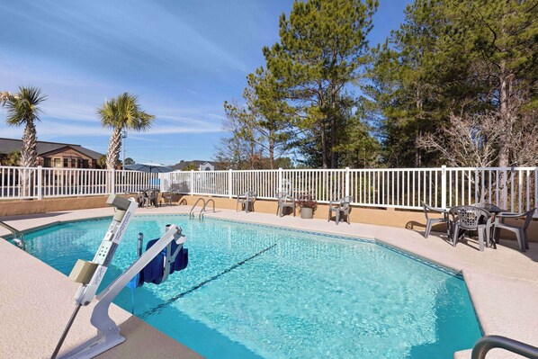 Seasonal outdoor pool, pool umbrellas