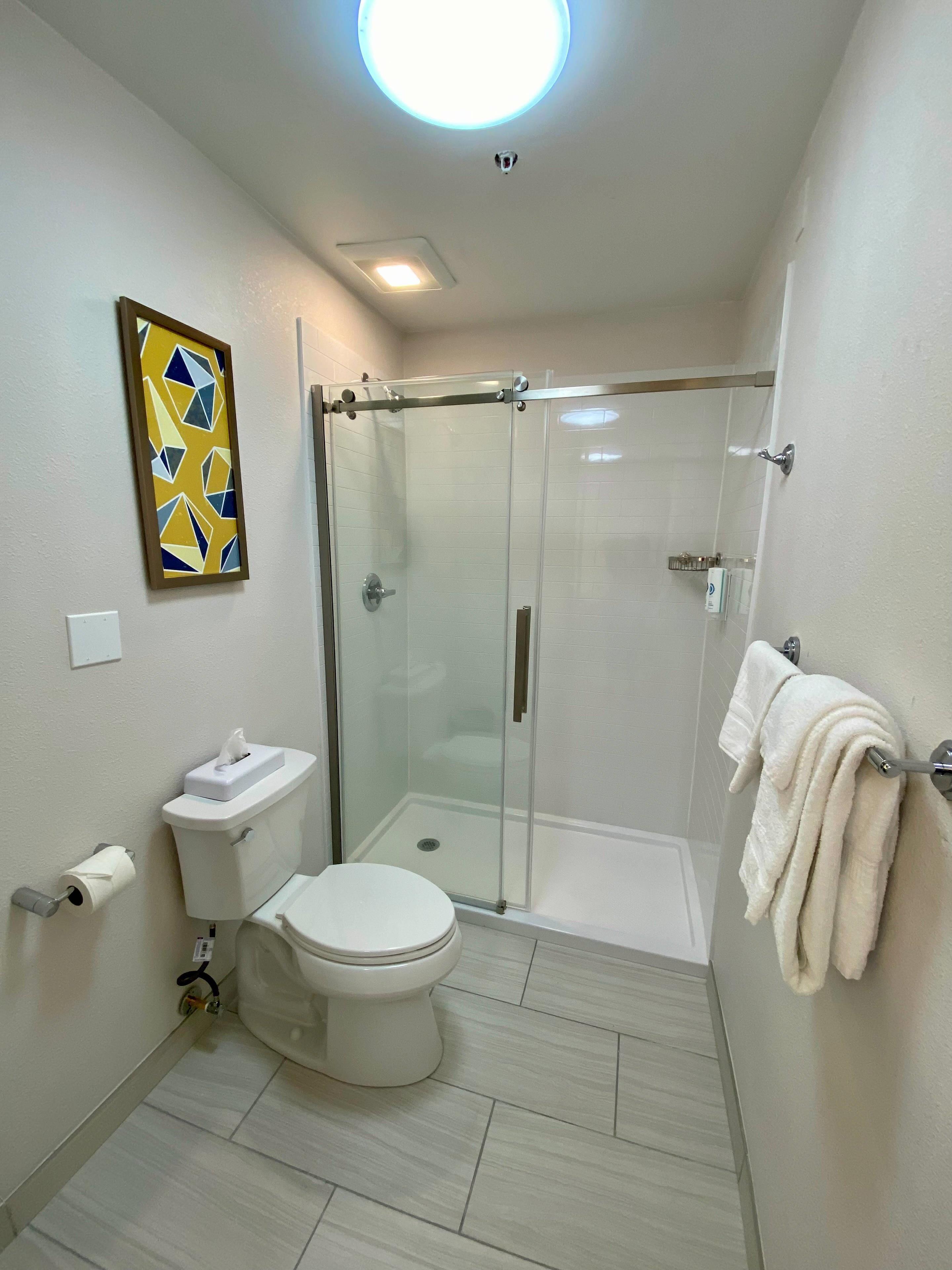 Suite, Multiple Beds, Non Smoking | Desk, laptop workspace, blackout drapes, iron/ironing board