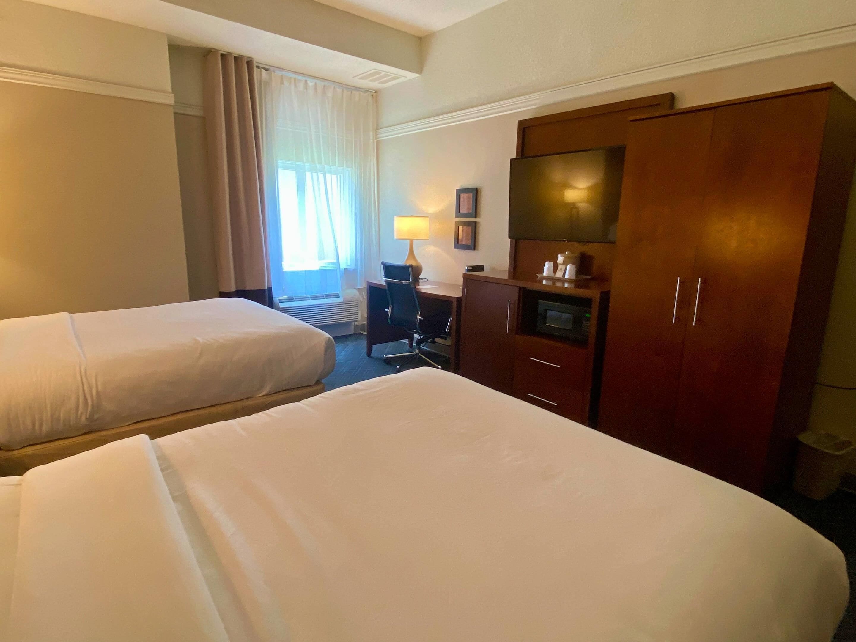 standard room, 2 queen beds, non smoking | desk, laptop workspace, blackout curtains, iron/ironing board