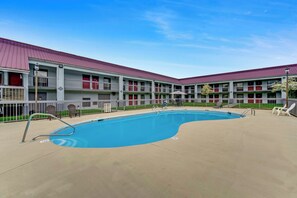 Seasonal outdoor pool, open 10:00 AM to 10:00 PM, pool umbrellas