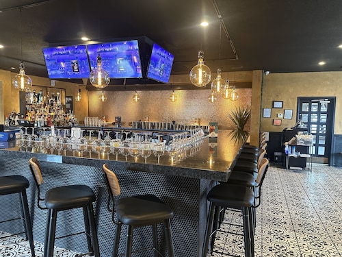 HomeTowne Studios by Red Roof Painted Post