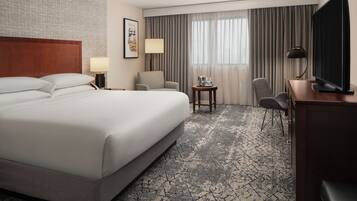 Down comforters, desk, blackout drapes, iron/ironing board