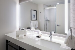 Combined shower/tub, free toiletries, hair dryer, slippers