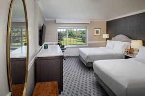 Premium bedding, down comforters, pillowtop beds, in-room safe