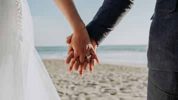Couples can exchange vows on the beach, surrounded by the soothing sound of the ocean.