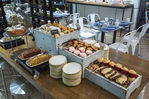 A buffet with various baked goods and pastries. - InterContinental Presidente Mexico City by IHG (Mexico City)