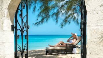 On the beach, white sand, sun-loungers, scuba diving