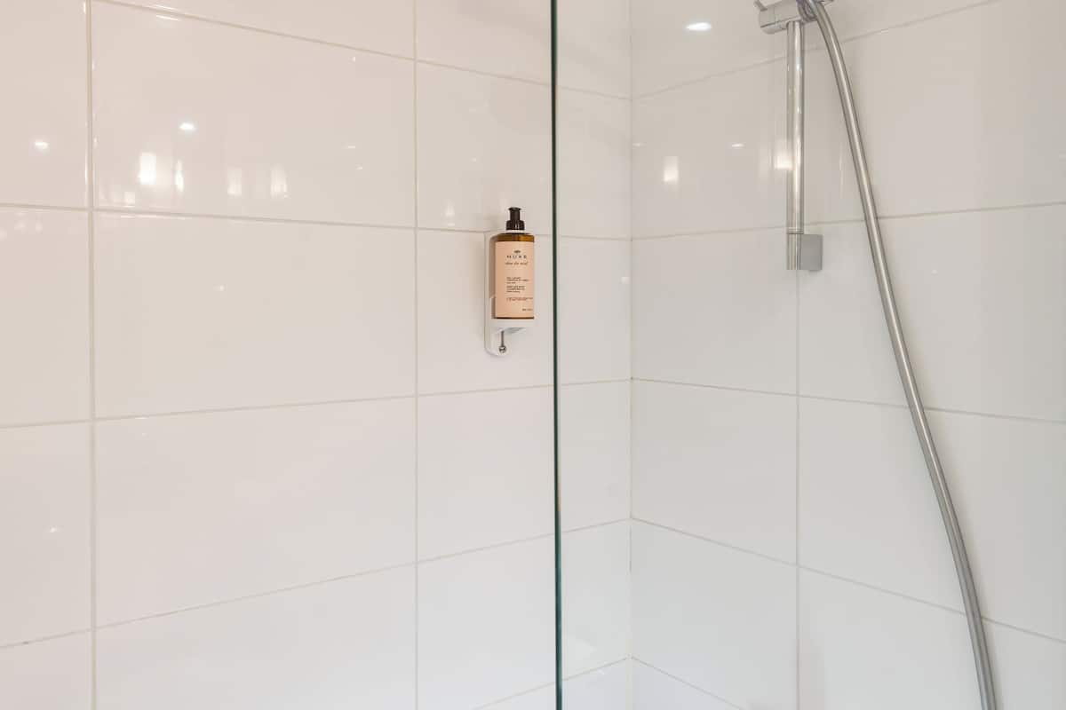 shower, eco-friendly toiletries, hair dryer, towels