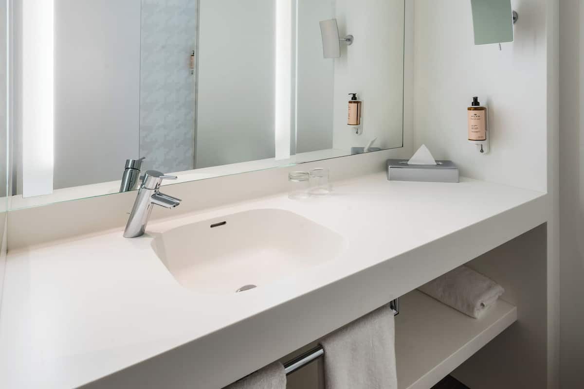 Shower, eco-friendly toiletries, hair dryer, towels