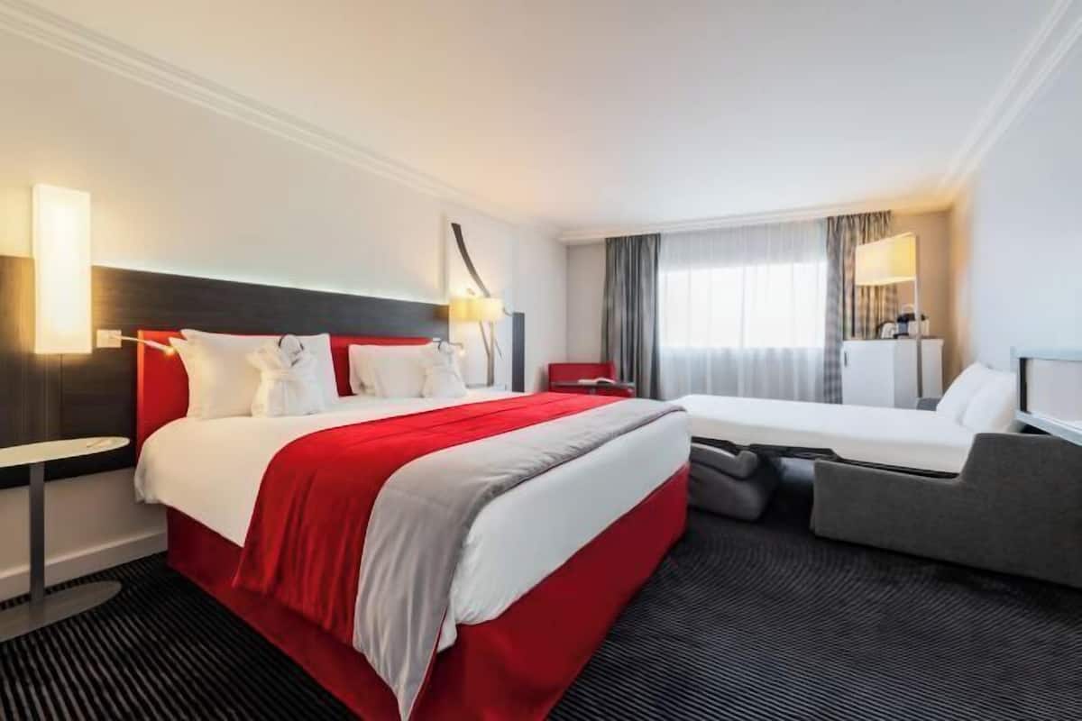 Luxe beddengoed, een kluis op de kamer, een bureau