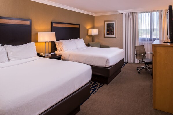 Down duvets, pillow-top beds, desk, laptop workspace