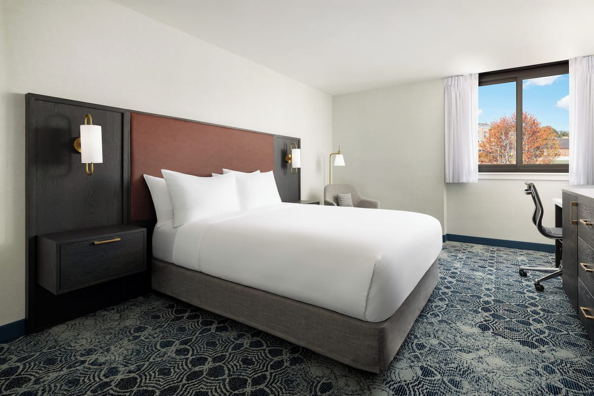 Down duvets, pillow-top beds, desk, laptop workspace