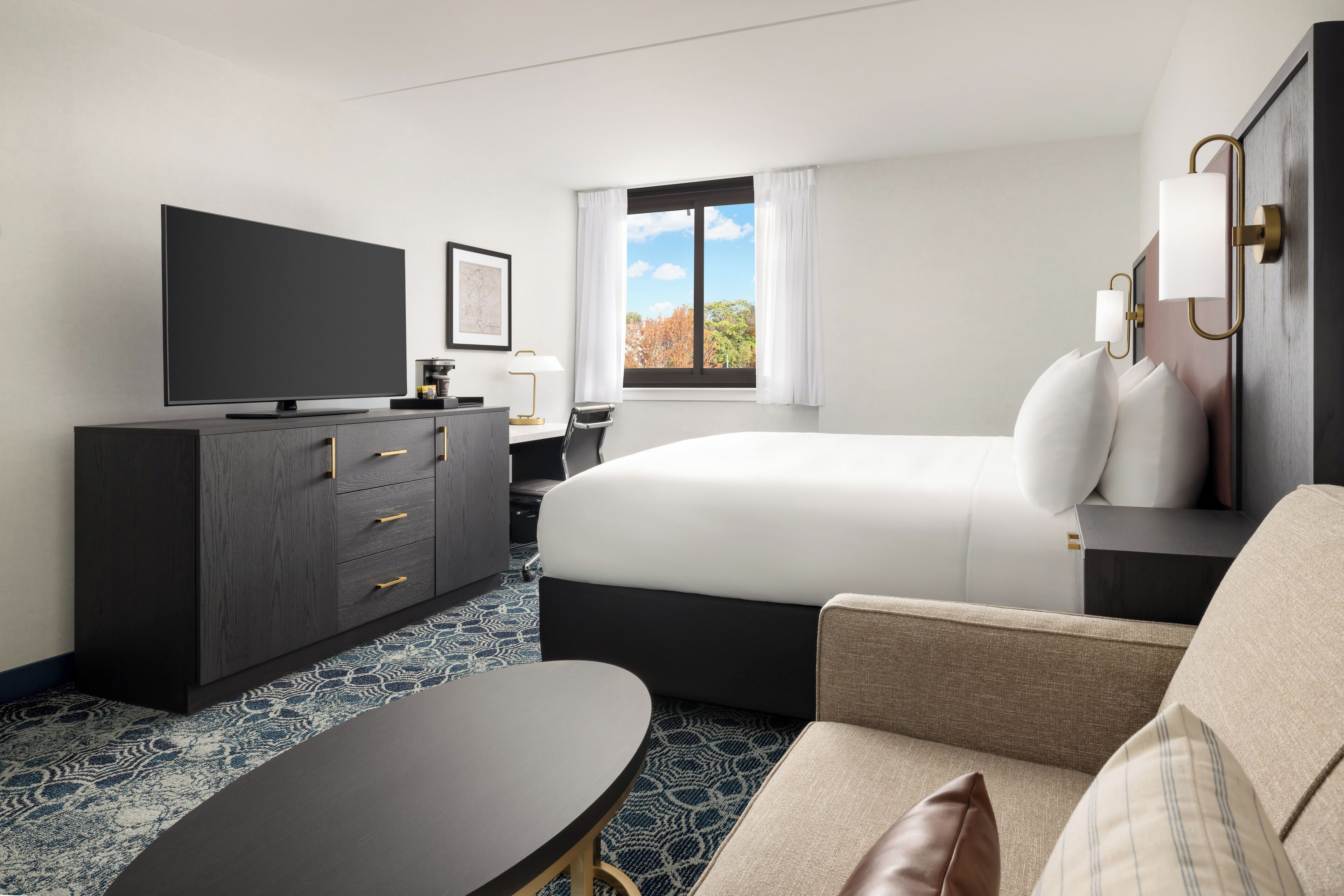 Down comforters, pillowtop beds, desk, laptop workspace