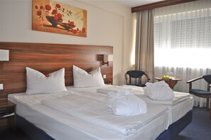 Chambre Confort double ou avec lits jumeaux | 1 chambre, literie hypoallergénique, minibar, coffre-fort