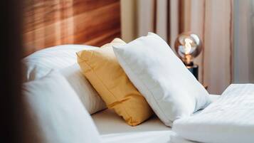Hypo-allergenic bedding, minibar, in-room safe, desk