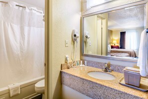 Bathtub, hair dryer, towels
