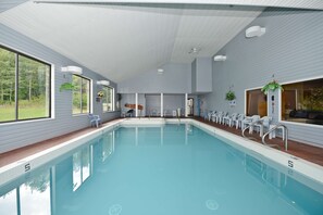 Relax by the pool with a clear view of the surrounding landscape.
