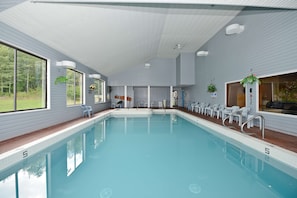 Relax by the pool with a clear view of the surrounding landscape.