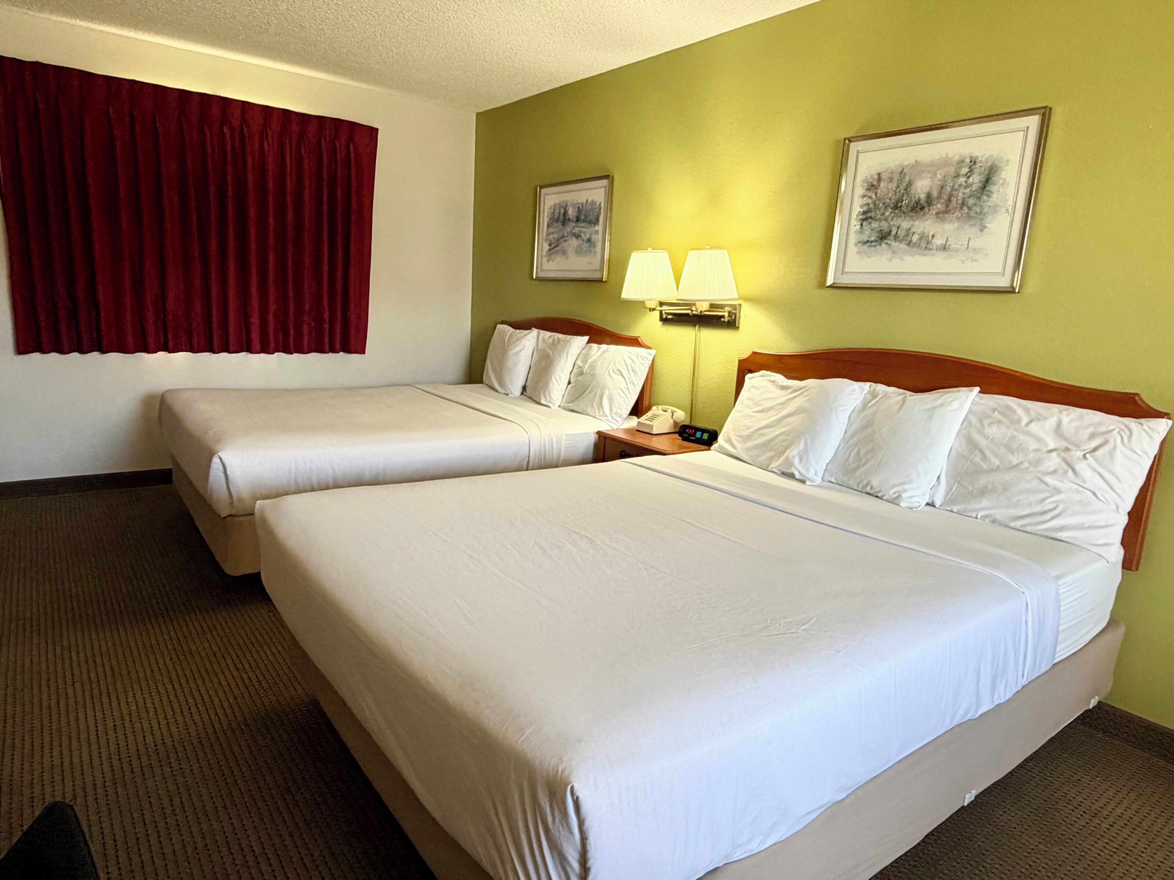 Iron/ironing board, cribs (free), WiFi (free), alarm clocks