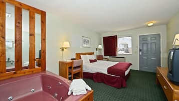 Deluxe Room, 1 Queen Bed, Jetted Tub | Television