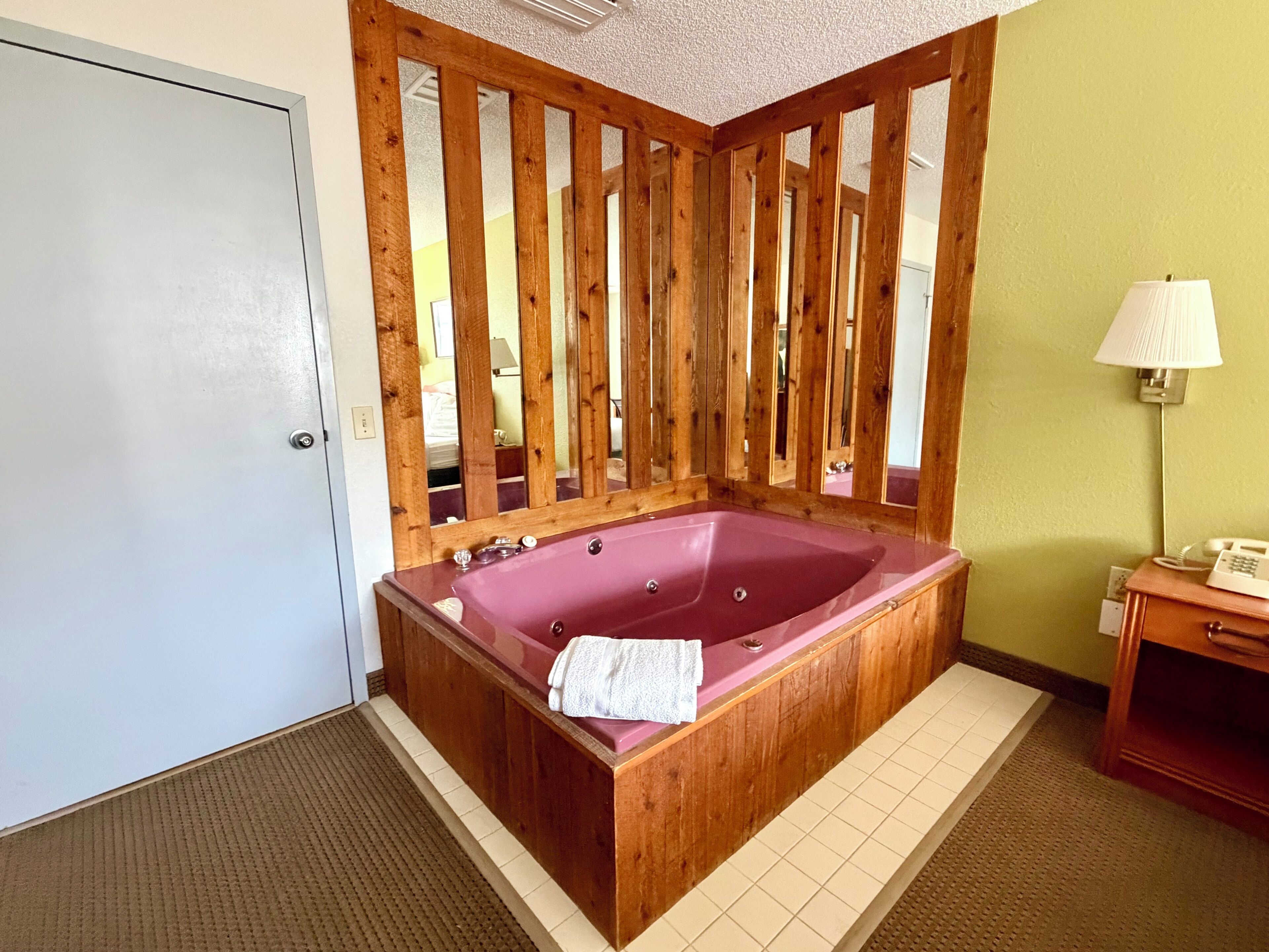 Deluxe Room, 1 Queen Bed, Jetted Tub | Iron/ironing board, free cots/infant beds, free WiFi, alarm clocks