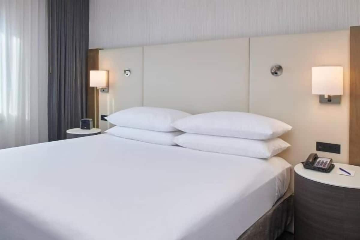 Hypo-allergenic bedding, down comforters, in-room safe, desk