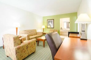 Family Suite, 1 King Bed with Sofa bed, Smoking | Living area | 42-inch TV with cable channels