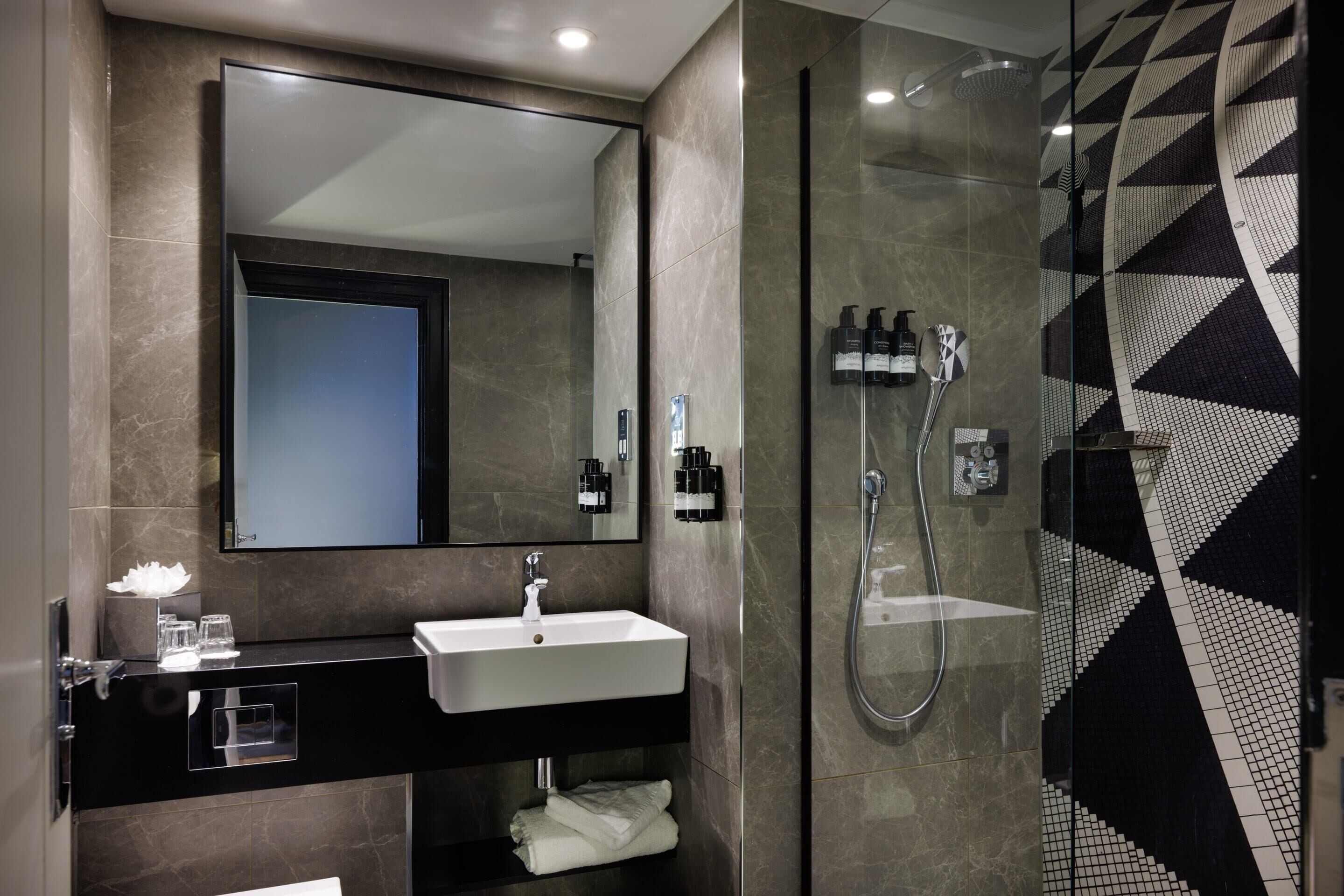 eco-friendly toiletries, hair dryer, towels, soap