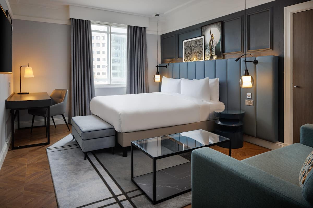 superior family city square view | hypo-allergenic bedding, in-room safe, desk, laptop workspace