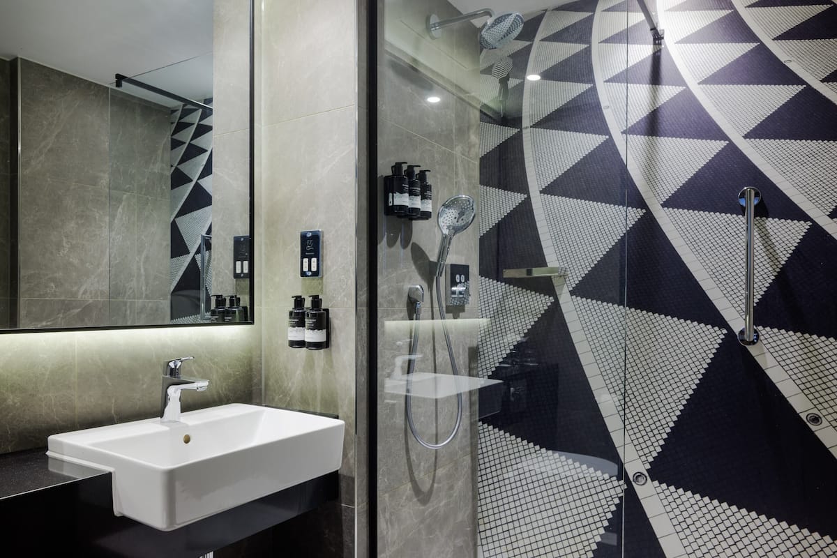 eco-friendly toiletries, hair dryer, towels, soap