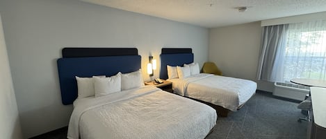 Hypo-allergenic bedding, down comforters, in-room safe, blackout drapes