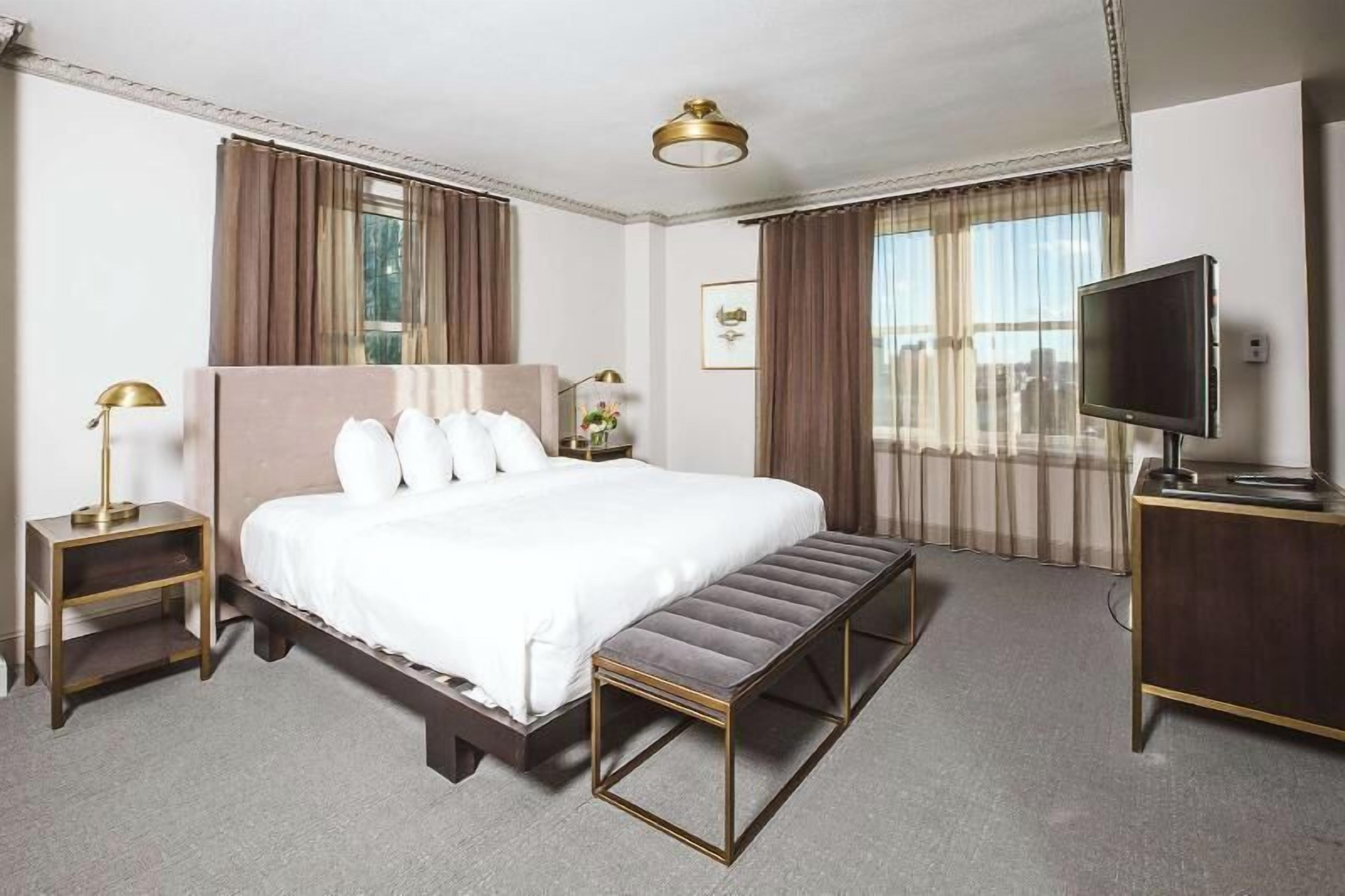 Premium bedding, down comforters, pillowtop beds, in-room safe