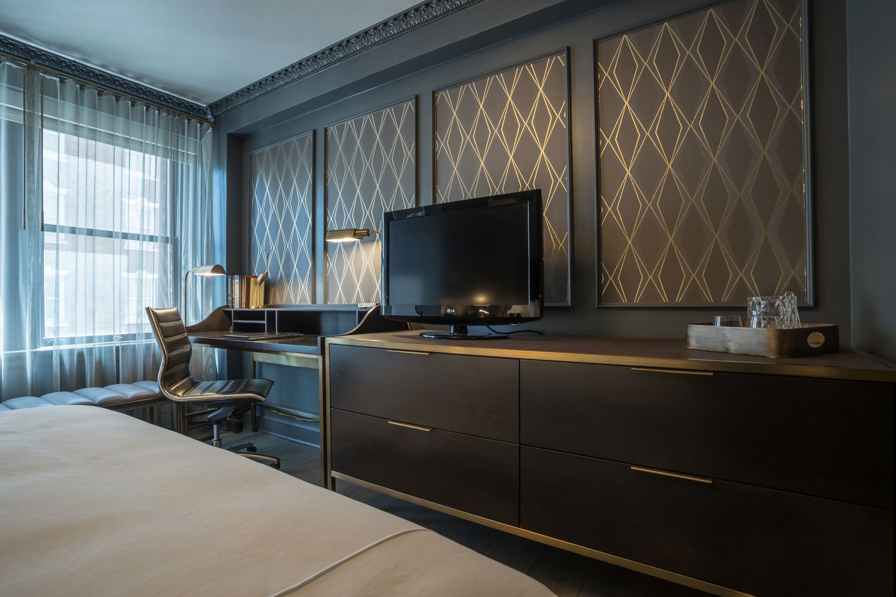 Premium bedding, down comforters, pillowtop beds, in-room safe