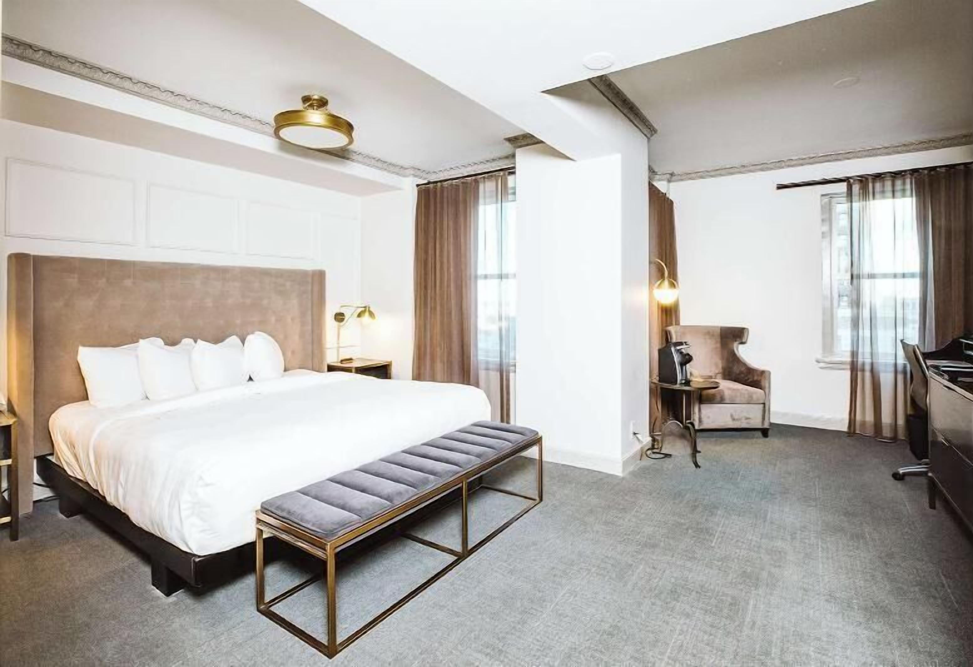 Premium bedding, down comforters, pillowtop beds, in-room safe