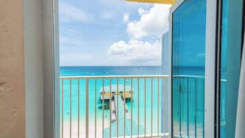 Premium Room, 1 King Bed, Beachfront | Premium bedding, down duvets, pillow-top beds, in-room safe