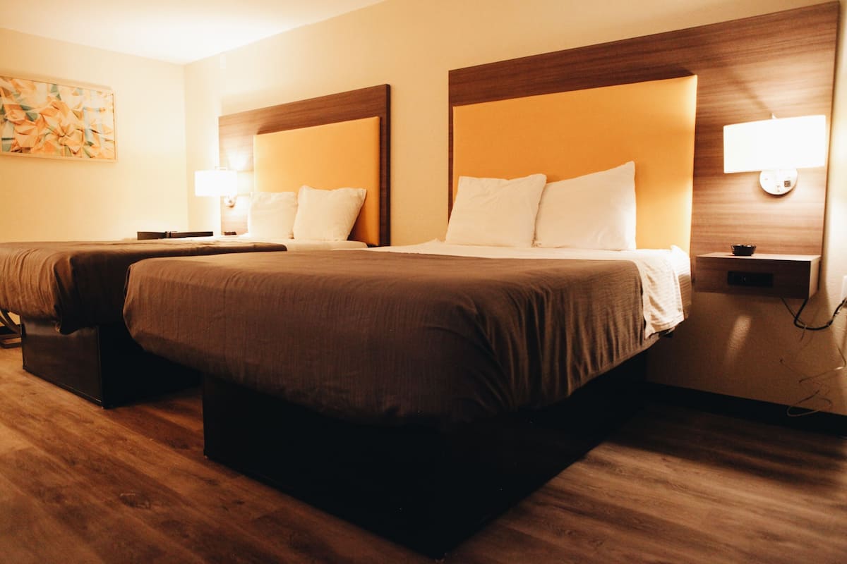 Memory-foam beds, desk, laptop workspace, soundproofing