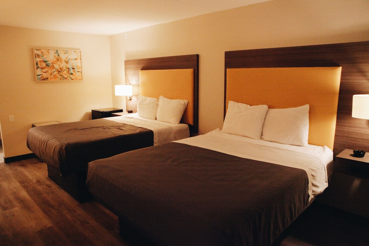 Memory-foam beds, desk, laptop workspace, soundproofing