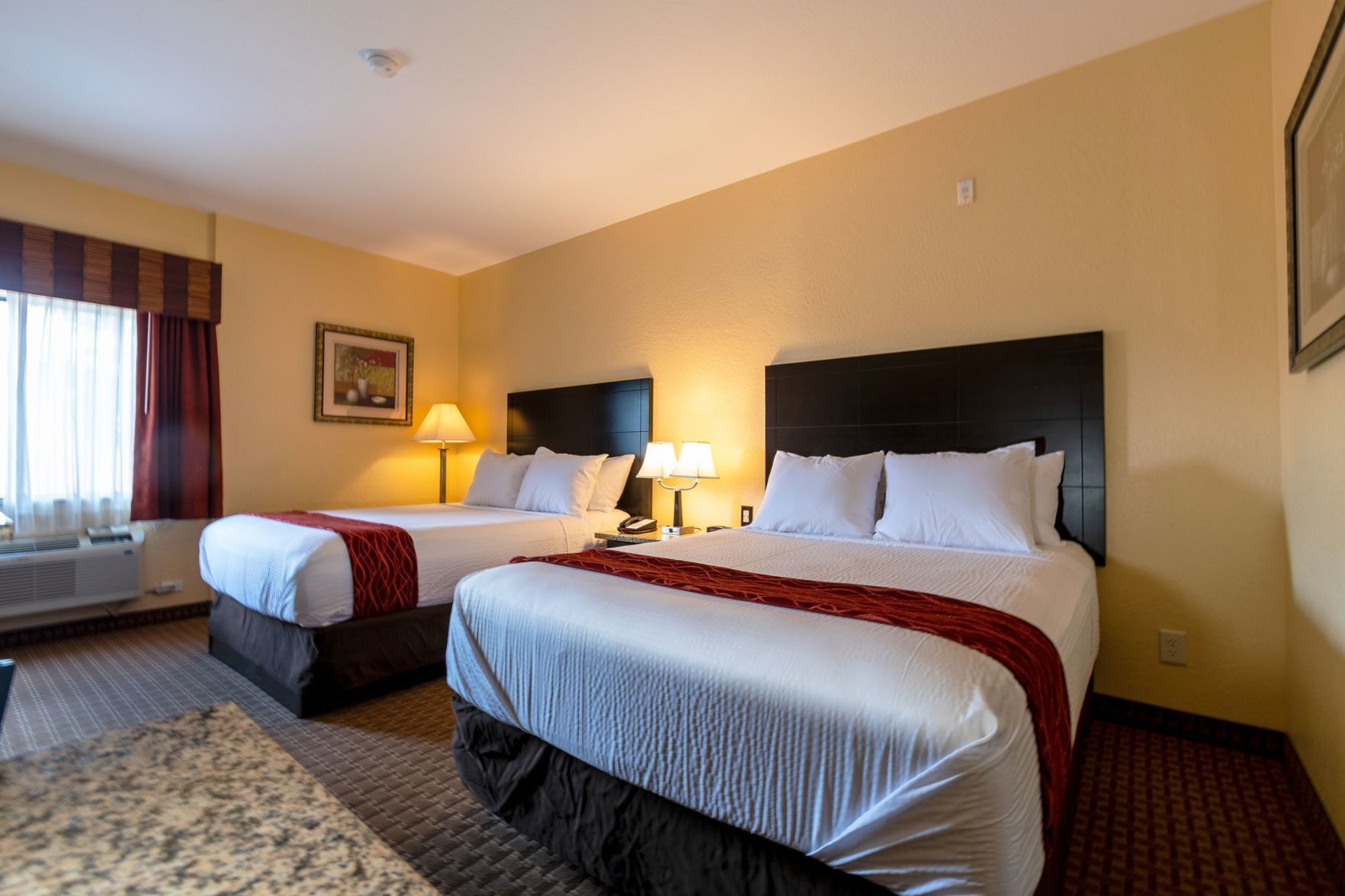 Premium bedding, pillowtop beds, desk, laptop workspace