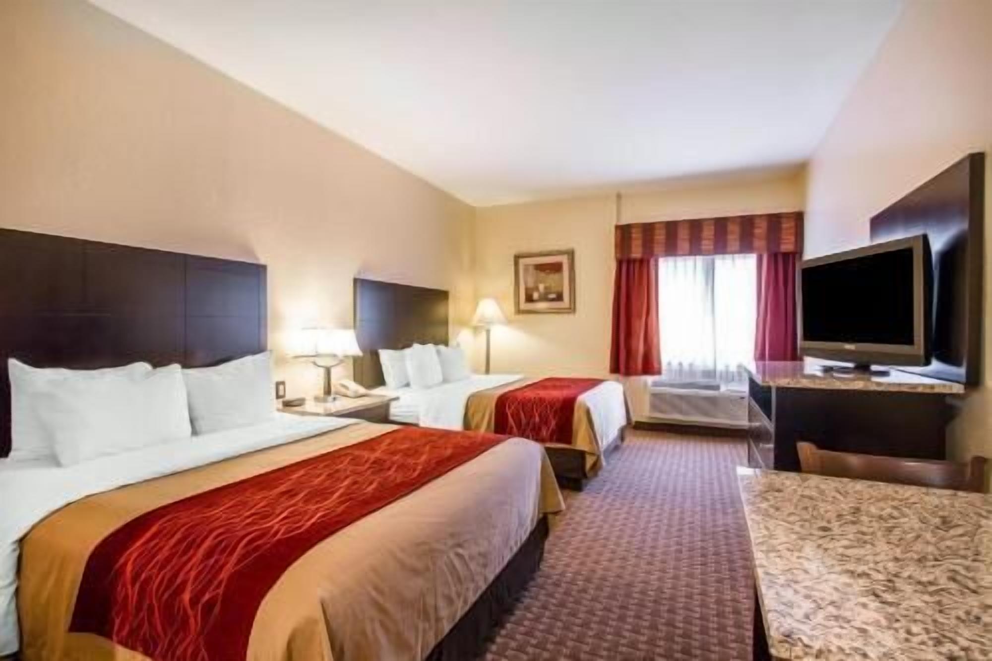 Premium bedding, pillowtop beds, desk, laptop workspace