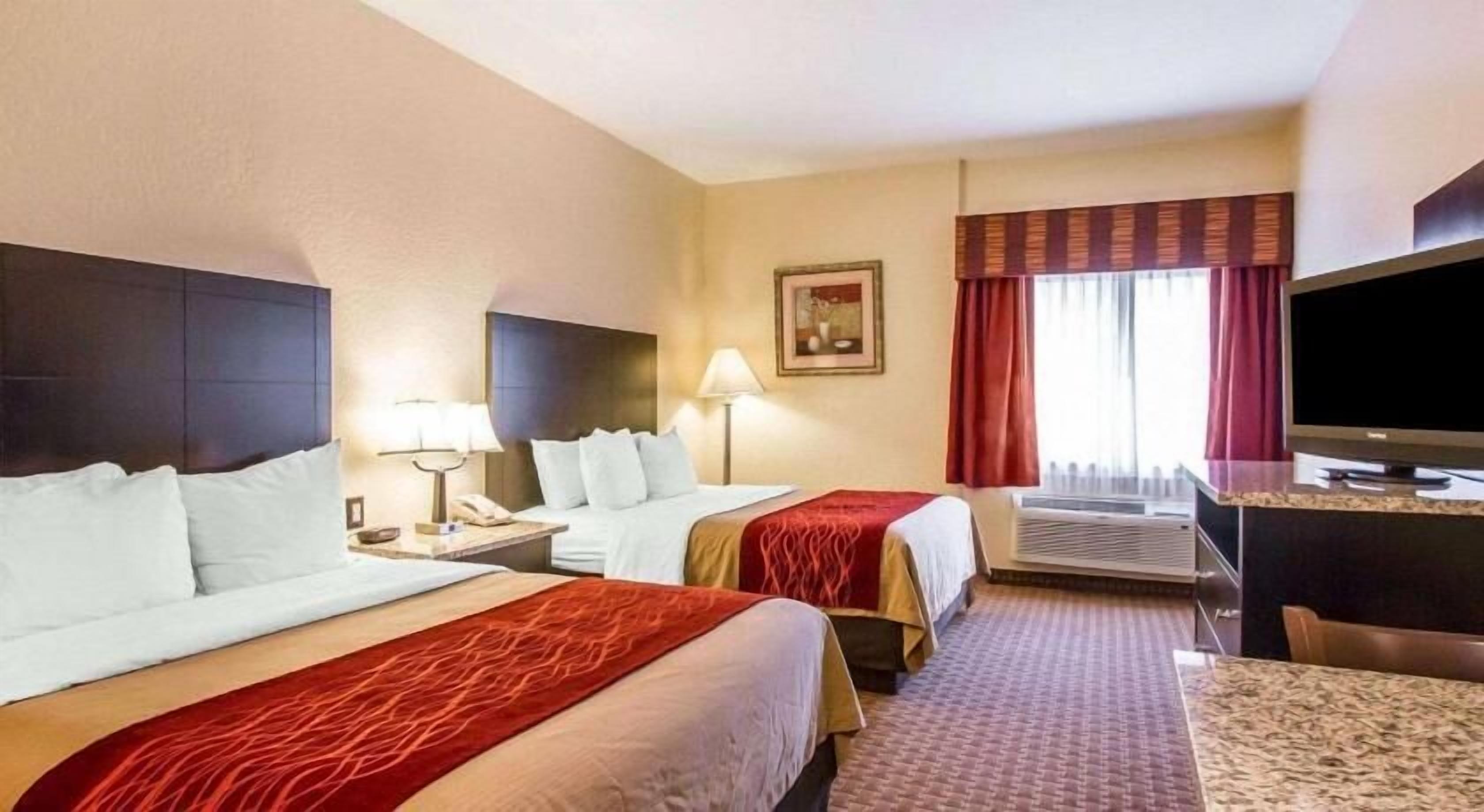 Premium bedding, pillowtop beds, desk, laptop workspace