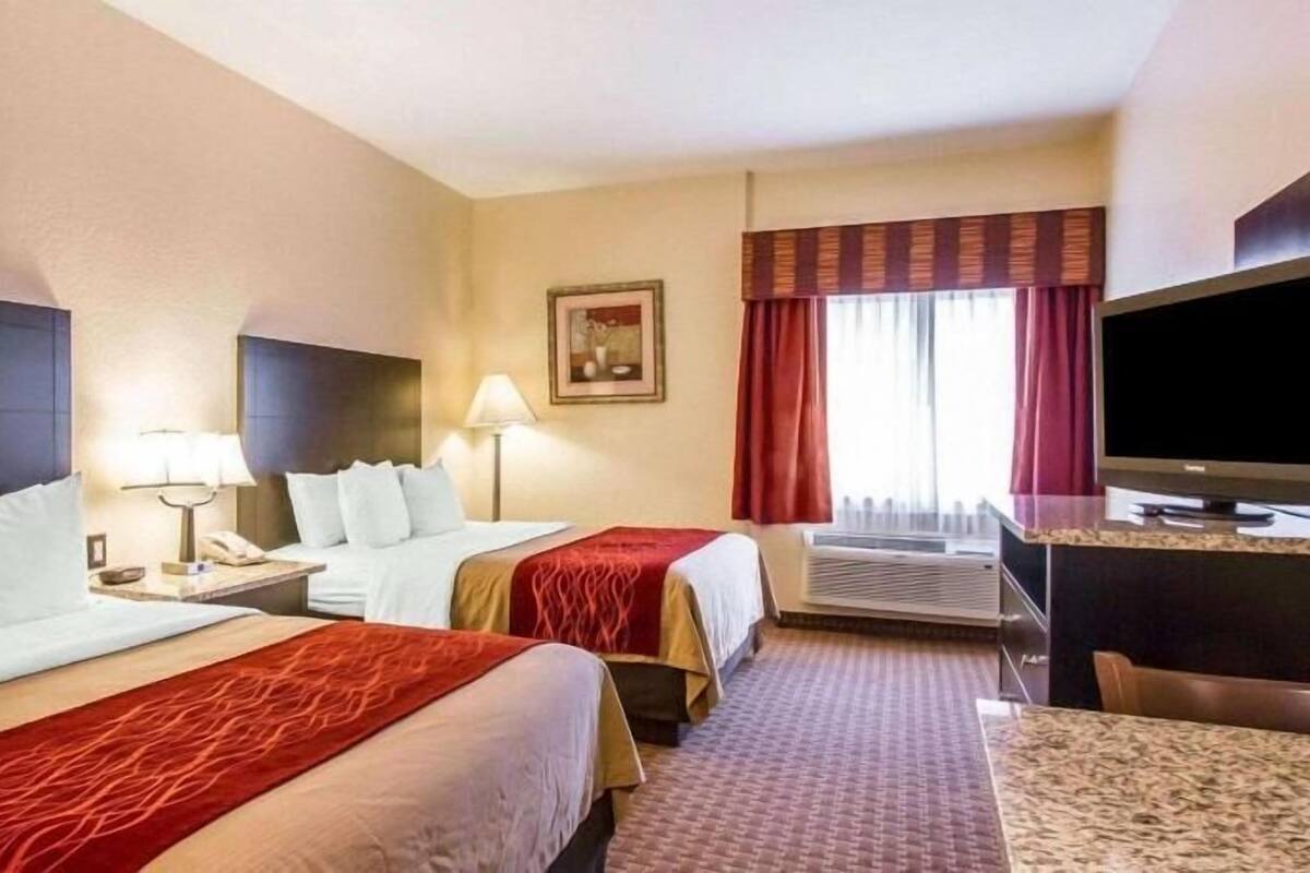 Premium bedding, pillowtop beds, desk, laptop workspace