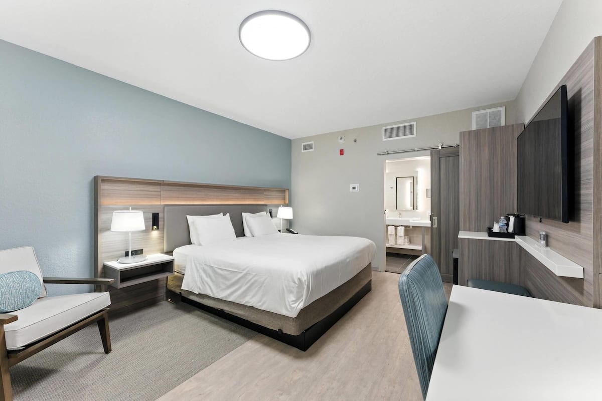 Premium bedding, desk, blackout curtains, iron/ironing board