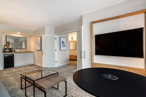 32-inch flat-screen TV with satellite channels, TV